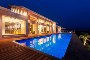 StayVista's Villa 107 at Canary Farms - Mountain-View Luxury Mansion with Infinity Pool & Sprawling Lawn